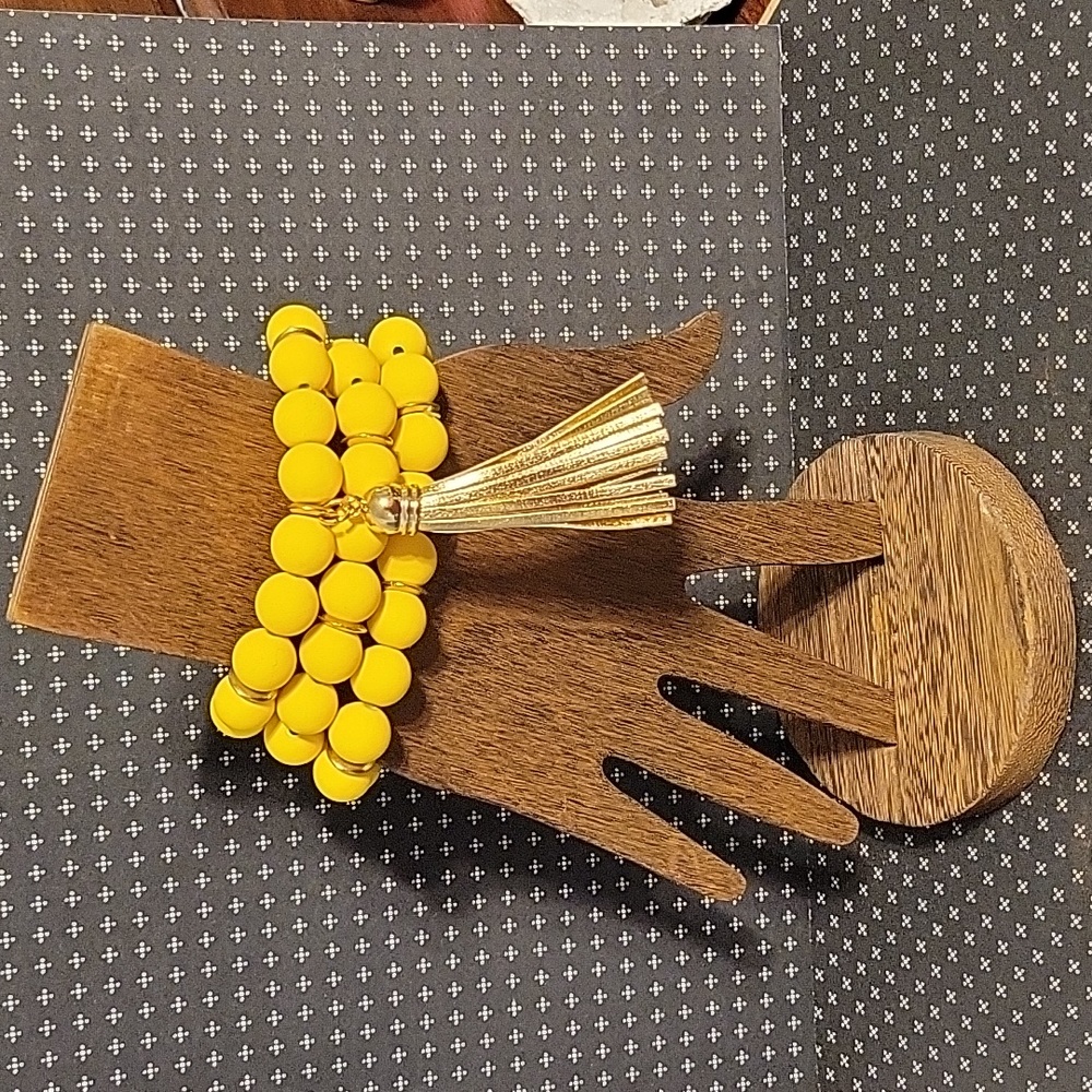 NWOT set of 3 Yellow Bead Gold Tassel stretch bracelets